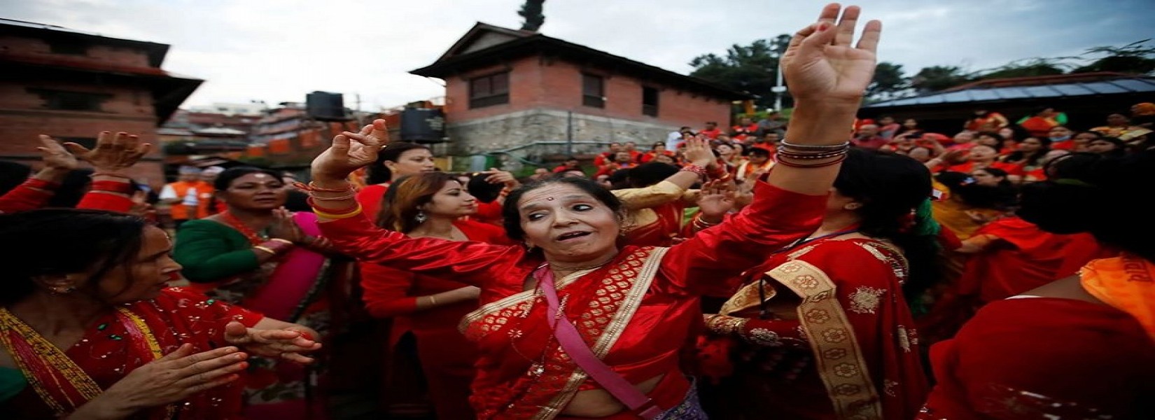 Women sing and dance at Pashupatinath temple during Teej festival